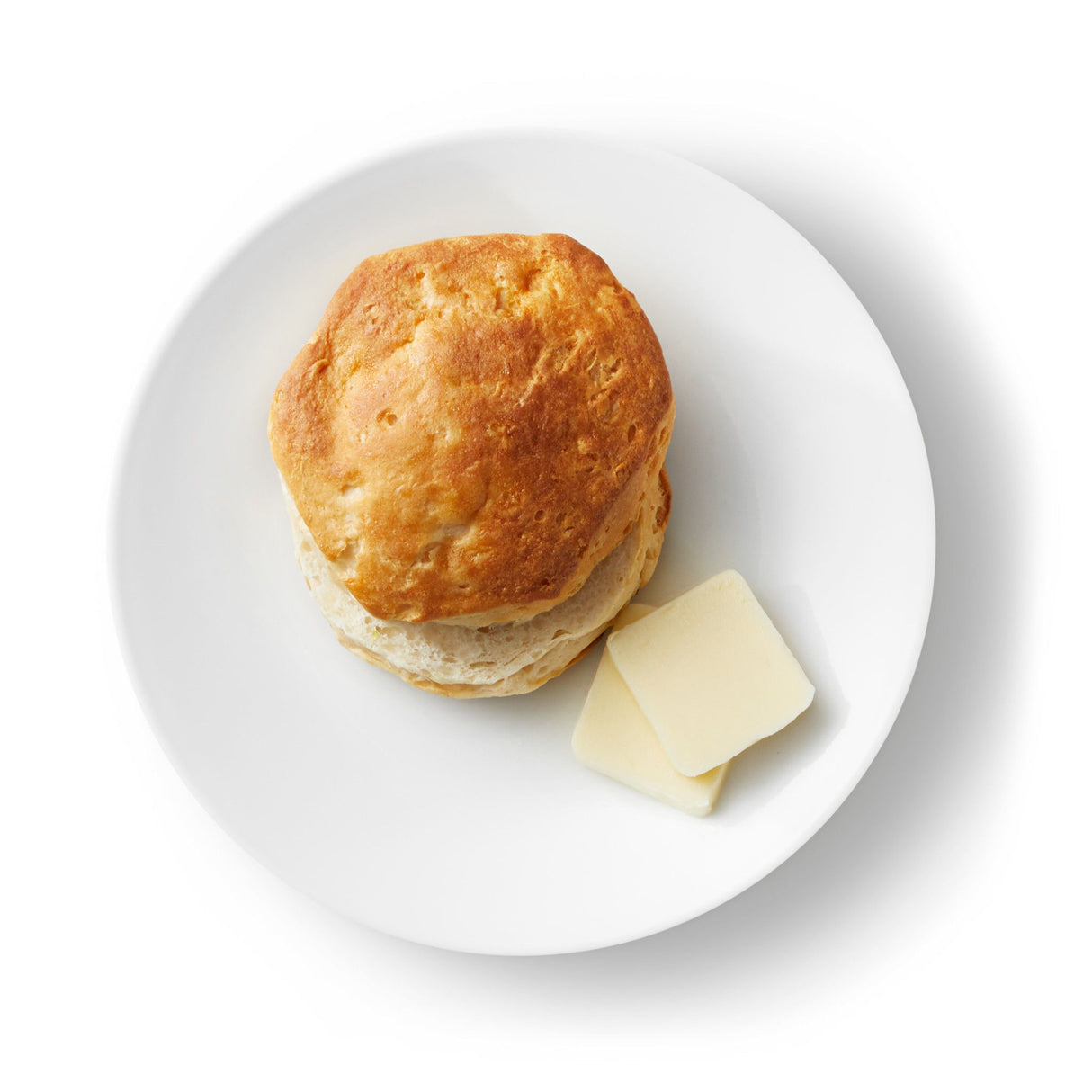 Roll on plate with butter