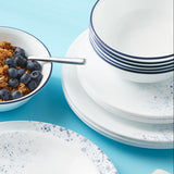  Indigo Speckle dinner, salad plate &amp; cereal bowls on table